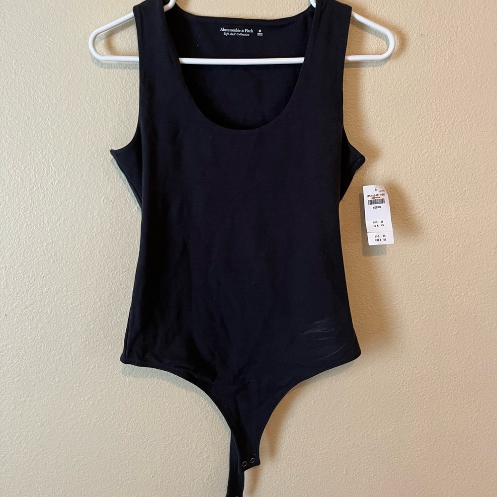 black scoop neck bodysuit